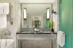 Marble bathrooms with steam showers and stand alone tubs 